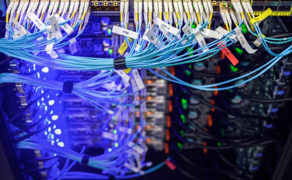 Working network hardware perfectly organized. Labels with port numbers on wires